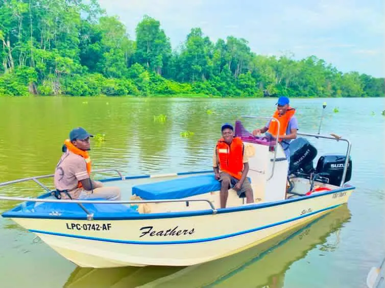 Resort riverboat with guides on the Kwanza River